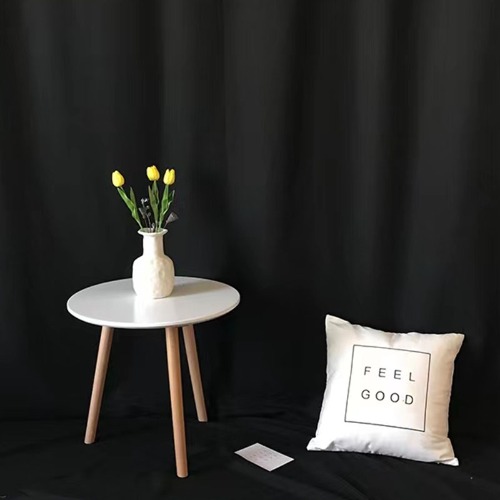 Can Screen Background Fabric be used outdoors, and how does it perform in natural light?